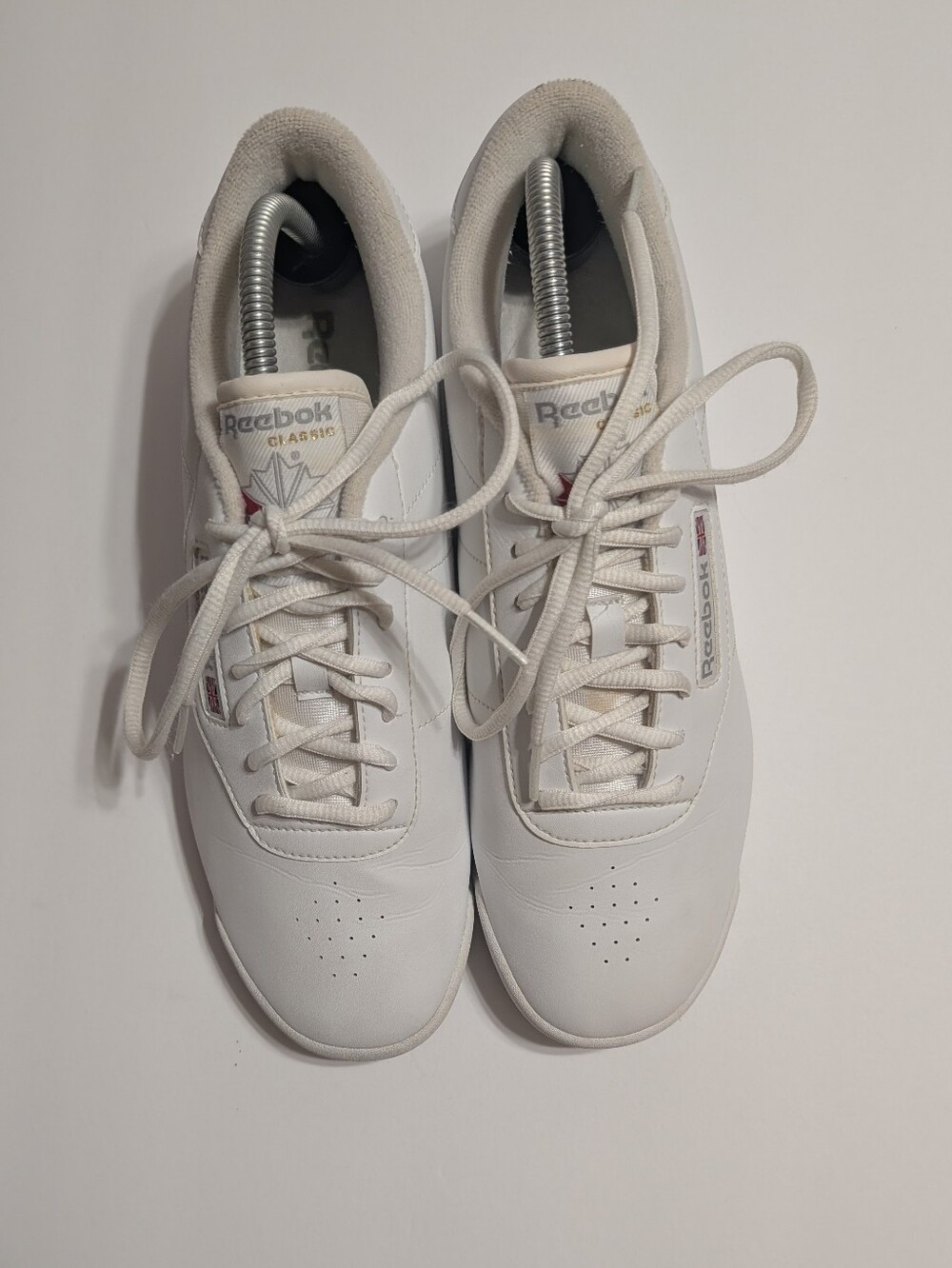 Reebok Women's White Leather Sneakers with Subtle Red Accent